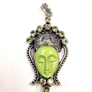 Sterling Silver Pendant with Green Carved Face and Lemon Quartz Accents